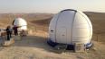 Dome of the new telescope. In the background, dome of its smaller brother